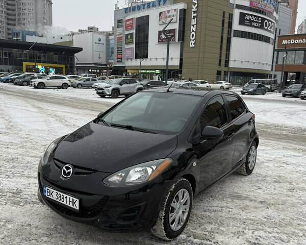 Чорний Мазда 2, об'ємом двигуна 1.5 л та пробігом 174 тис. км за 7250 $, фото 1 на Automoto.ua