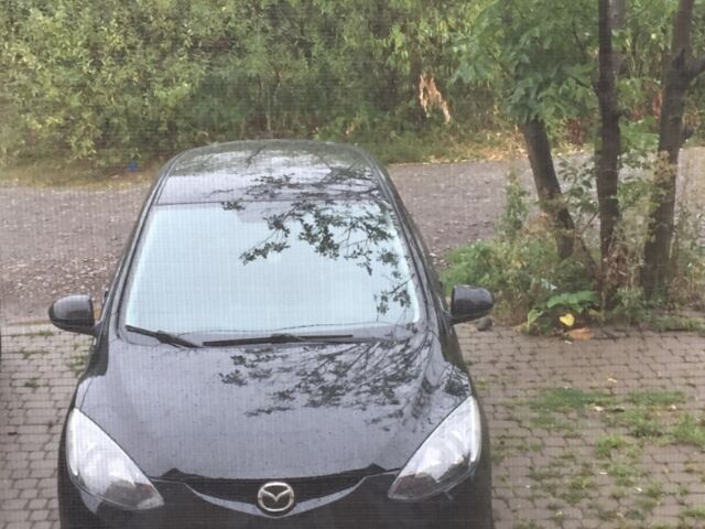 Чорний Мазда 2, об'ємом двигуна 1.5 л та пробігом 77 тис. км за 5300 $, фото 1 на Automoto.ua