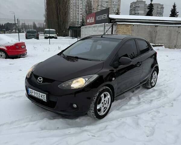 Фиолетовый Мазда 2, объемом двигателя 1.5 л и пробегом 144 тыс. км за 6900 $, фото 1 на Automoto.ua