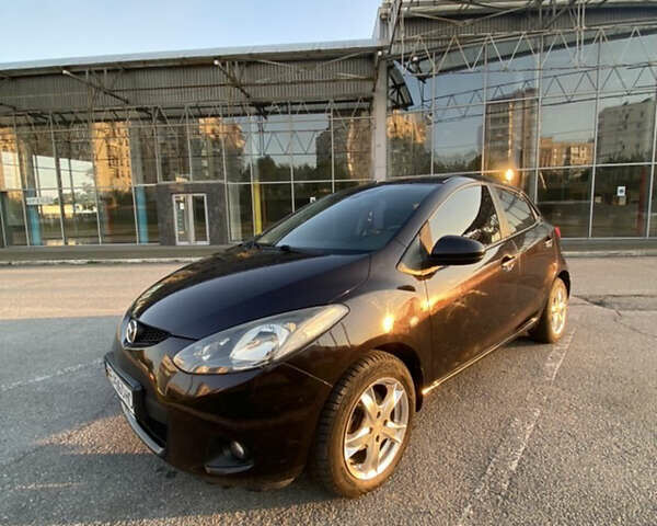 Фіолетовий Мазда 2, об'ємом двигуна 1.5 л та пробігом 143 тис. км за 5500 $, фото 1 на Automoto.ua