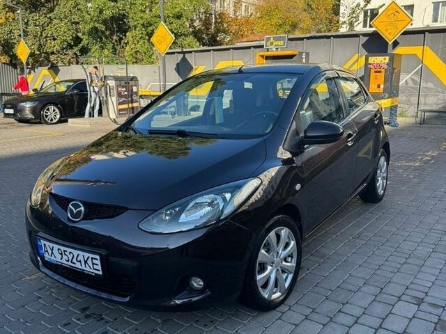 Фіолетовий Мазда 2, об'ємом двигуна 1.5 л та пробігом 221 тис. км за 5300 $, фото 1 на Automoto.ua