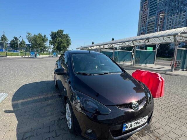 Фиолетовый Мазда 2, объемом двигателя 1.5 л и пробегом 180 тыс. км за 5800 $, фото 1 на Automoto.ua