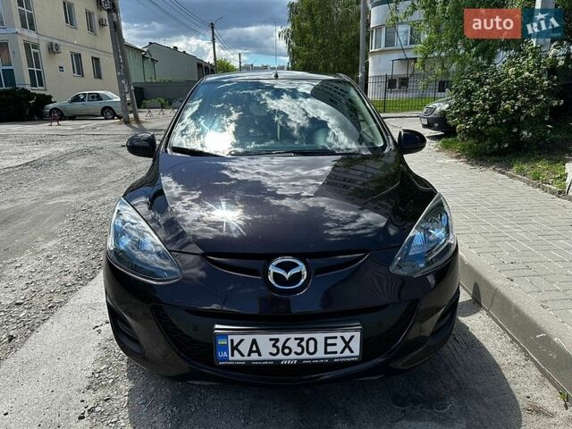 Фіолетовий Мазда 2, об'ємом двигуна 1.5 л та пробігом 142 тис. км за 7600 $, фото 1 на Automoto.ua