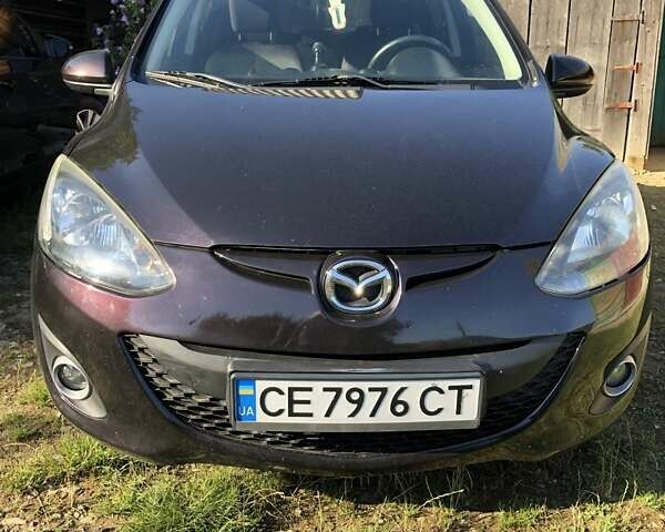 Фиолетовый Мазда 2, объемом двигателя 1.5 л и пробегом 120 тыс. км за 6000 $, фото 1 на Automoto.ua