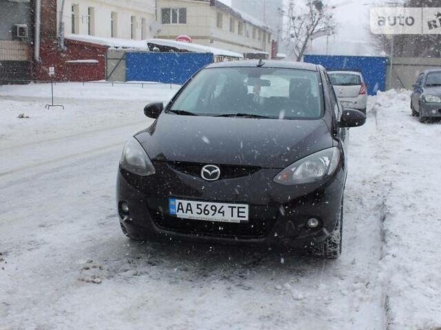 Фіолетовий Мазда 2, об'ємом двигуна 1.5 л та пробігом 75 тис. км за 8390 $, фото 1 на Automoto.ua