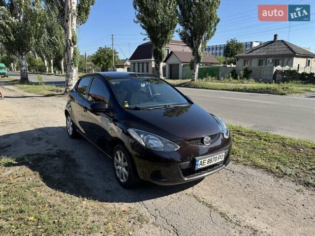 Коричневий Мазда 2, об'ємом двигуна 1.5 л та пробігом 126 тис. км за 6700 $, фото 1 на Automoto.ua