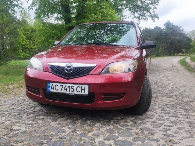 Красный Мазда 2, объемом двигателя 1.6 л и пробегом 181 тыс. км за 3300 $, фото 1 на Automoto.ua