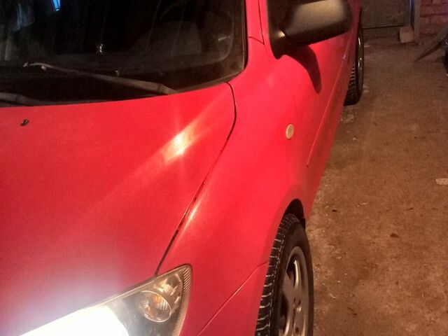 Червоний Мазда 2, об'ємом двигуна 1.2 л та пробігом 160 тис. км за 4000 $, фото 1 на Automoto.ua