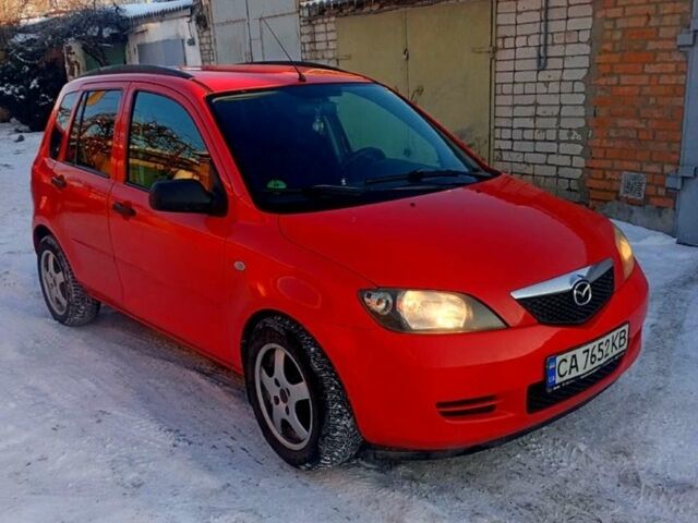Червоний Мазда 2, об'ємом двигуна 1.25 л та пробігом 160 тис. км за 4500 $, фото 1 на Automoto.ua