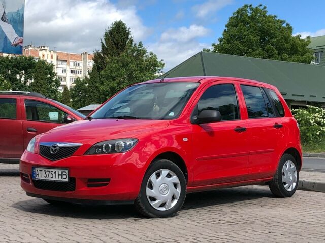 Красный Мазда 2, объемом двигателя 1.3 л и пробегом 110 тыс. км за 4500 $, фото 1 на Automoto.ua