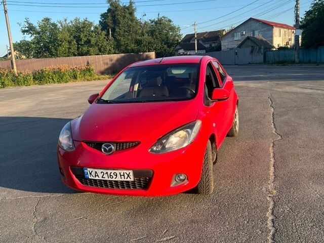 Червоний Мазда 2, об'ємом двигуна 1.4 л та пробігом 223 тис. км за 3300 $, фото 1 на Automoto.ua