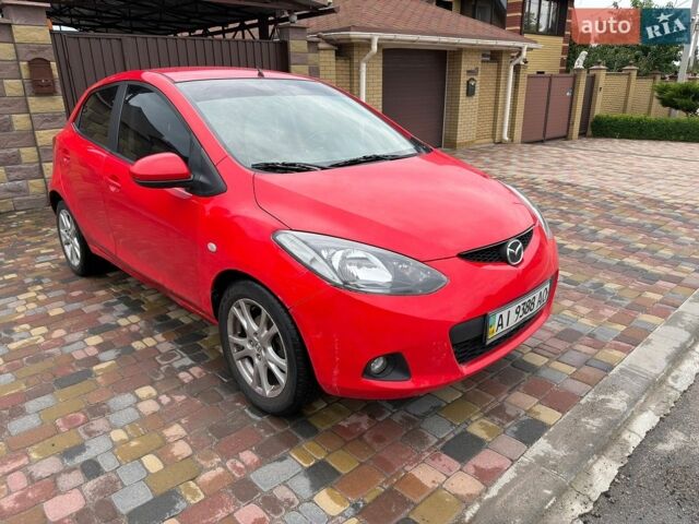 Червоний Мазда 2, об'ємом двигуна 1.5 л та пробігом 124 тис. км за 5500 $, фото 1 на Automoto.ua