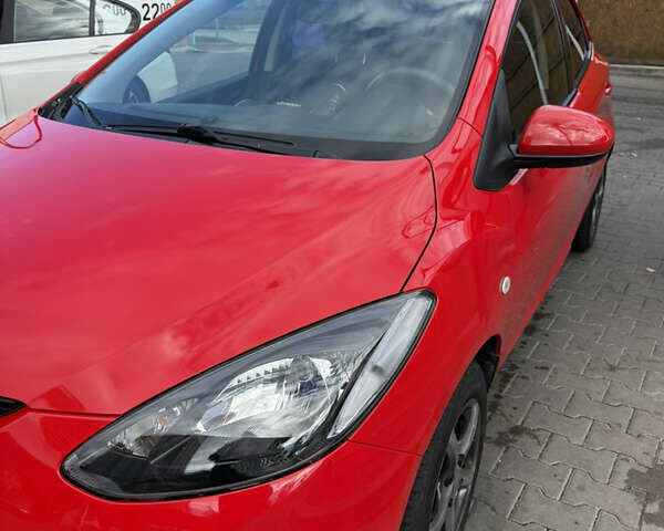 Красный Мазда 2, объемом двигателя 1.5 л и пробегом 208 тыс. км за 6200 $, фото 1 на Automoto.ua