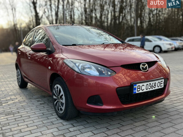 Красный Мазда 2, объемом двигателя 1.4 л и пробегом 110 тыс. км за 5213 $, фото 1 на Automoto.ua