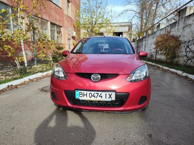 Красный Мазда 2, объемом двигателя 1.5 л и пробегом 138 тыс. км за 6500 $, фото 1 на Automoto.ua