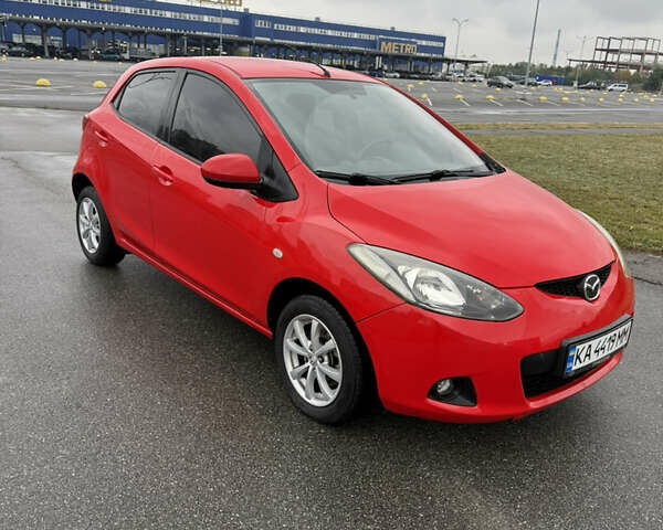 Красный Мазда 2, объемом двигателя 1.5 л и пробегом 165 тыс. км за 6650 $, фото 1 на Automoto.ua