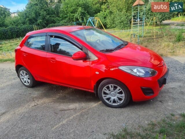 Червоний Мазда 2, об'ємом двигуна 1.5 л та пробігом 176 тис. км за 5800 $, фото 1 на Automoto.ua