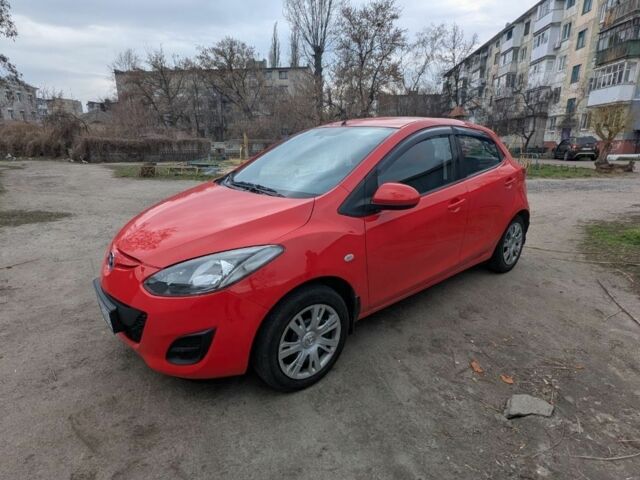 Червоний Мазда 2, об'ємом двигуна 1.5 л та пробігом 175 тис. км за 5800 $, фото 1 на Automoto.ua