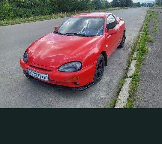 Красный Мазда 2, объемом двигателя 2 л и пробегом 380 тыс. км за 3695 $, фото 1 на Automoto.ua
