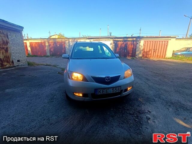 Мазда 2, объемом двигателя 1.4 л и пробегом 245 тыс. км за 1399 $, фото 1 на Automoto.ua
