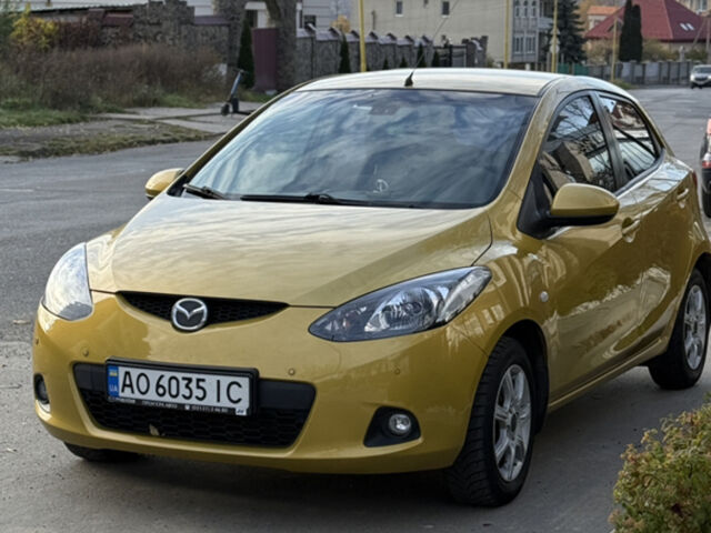 Жовтий Мазда 2, об'ємом двигуна 1.5 л та пробігом 135 тис. км за 7000 $, фото 1 на Automoto.ua