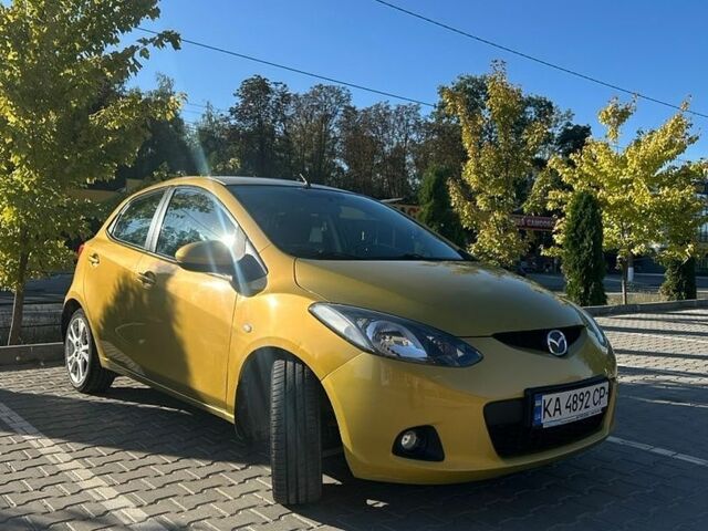Желтый Мазда 2, объемом двигателя 1.5 л и пробегом 139 тыс. км за 6500 $, фото 1 на Automoto.ua