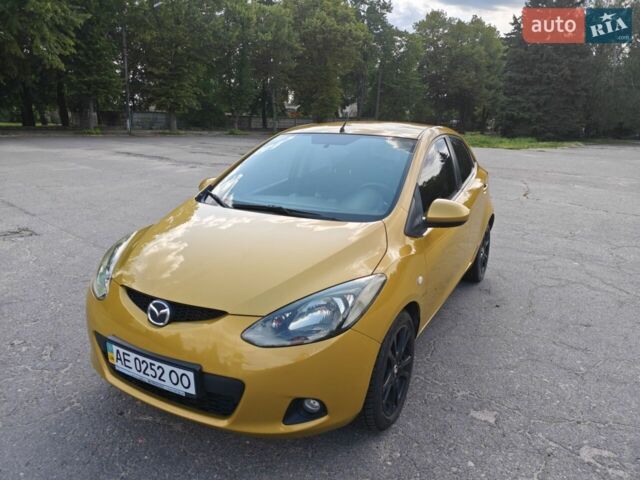 Желтый Мазда 2, объемом двигателя 1.5 л и пробегом 74 тыс. км за 5600 $, фото 1 на Automoto.ua