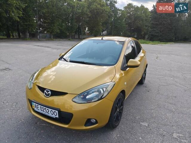 Жовтий Мазда 2, об'ємом двигуна 1.5 л та пробігом 74 тис. км за 5600 $, фото 1 на Automoto.ua