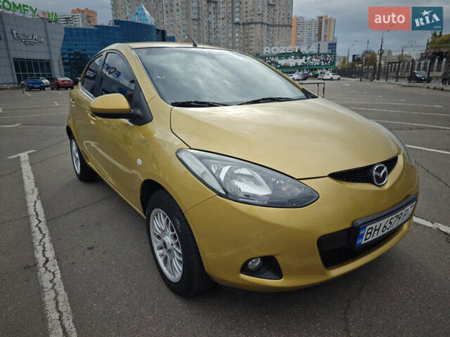 Жовтий Мазда 2, об'ємом двигуна 1.5 л та пробігом 103 тис. км за 6200 $, фото 1 на Automoto.ua