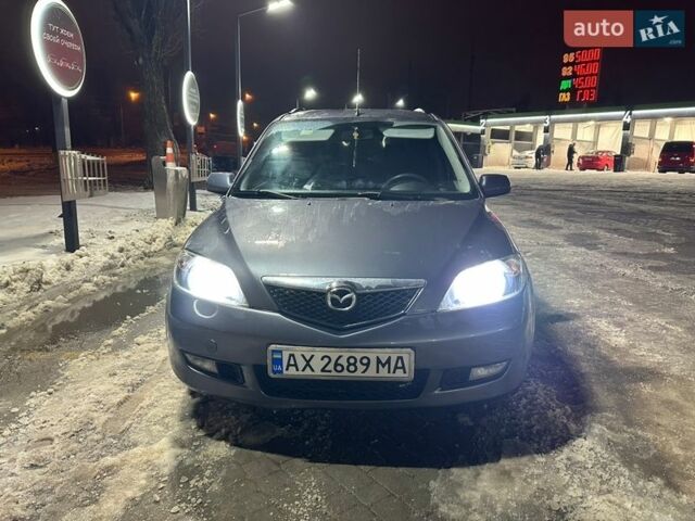 Серый Мазда 2, объемом двигателя 1.4 л и пробегом 295 тыс. км за 3500 $, фото 1 на Automoto.ua