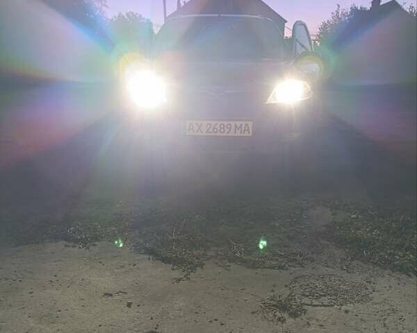 Серый Мазда 2, объемом двигателя 1.4 л и пробегом 290 тыс. км за 4200 $, фото 1 на Automoto.ua