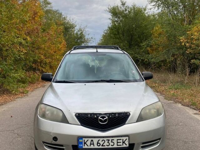 Серый Мазда 2, объемом двигателя 1.4 л и пробегом 248 тыс. км за 3499 $, фото 1 на Automoto.ua