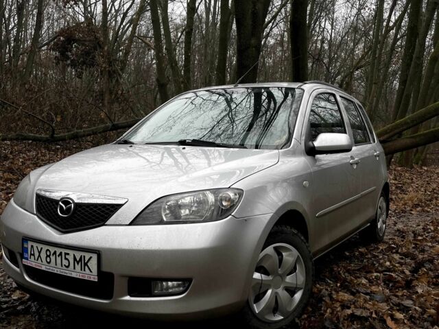 Серый Мазда 2, объемом двигателя 1.6 л и пробегом 158 тыс. км за 4000 $, фото 1 на Automoto.ua