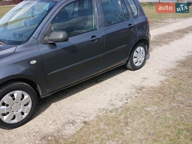 Сірий Мазда 2, об'ємом двигуна 1.39 л та пробігом 150 тис. км за 3300 $, фото 1 на Automoto.ua