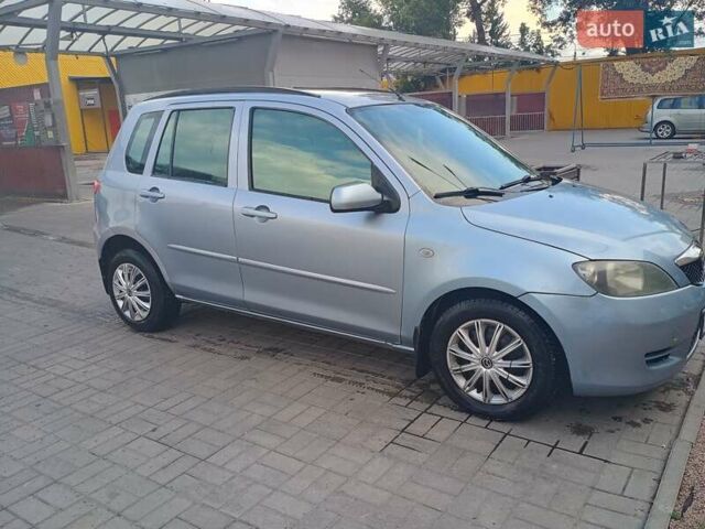 Серый Мазда 2, объемом двигателя 1.4 л и пробегом 250 тыс. км за 3400 $, фото 1 на Automoto.ua