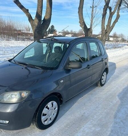 Серый Мазда 2, объемом двигателя 1.39 л и пробегом 150 тыс. км за 3400 $, фото 1 на Automoto.ua