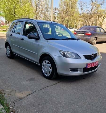 Сірий Мазда 2, об'ємом двигуна 1.4 л та пробігом 218 тис. км за 4900 $, фото 1 на Automoto.ua