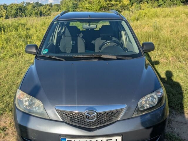 Сірий Мазда 2, об'ємом двигуна 1.4 л та пробігом 187 тис. км за 5500 $, фото 1 на Automoto.ua
