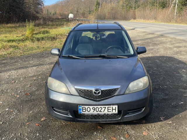Серый Мазда 2, объемом двигателя 1.4 л и пробегом 173 тыс. км за 3800 $, фото 1 на Automoto.ua