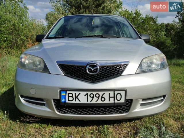 Сірий Мазда 2, об'ємом двигуна 1.4 л та пробігом 290 тис. км за 3500 $, фото 1 на Automoto.ua