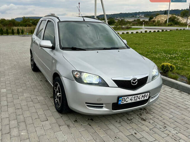 Серый Мазда 2, объемом двигателя 1.4 л и пробегом 321 тыс. км за 3800 $, фото 1 на Automoto.ua