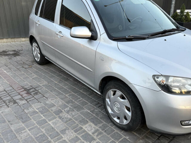 Сірий Мазда 2, об'ємом двигуна 1.39 л та пробігом 126 тис. км за 4700 $, фото 1 на Automoto.ua