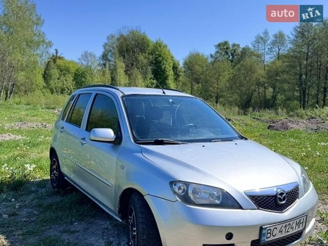 Серый Мазда 2, объемом двигателя 1.39 л и пробегом 334 тыс. км за 2800 $, фото 1 на Automoto.ua