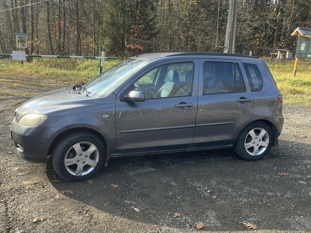 Сірий Мазда 2, об'ємом двигуна 1.4 л та пробігом 173 тис. км за 3800 $, фото 1 на Automoto.ua