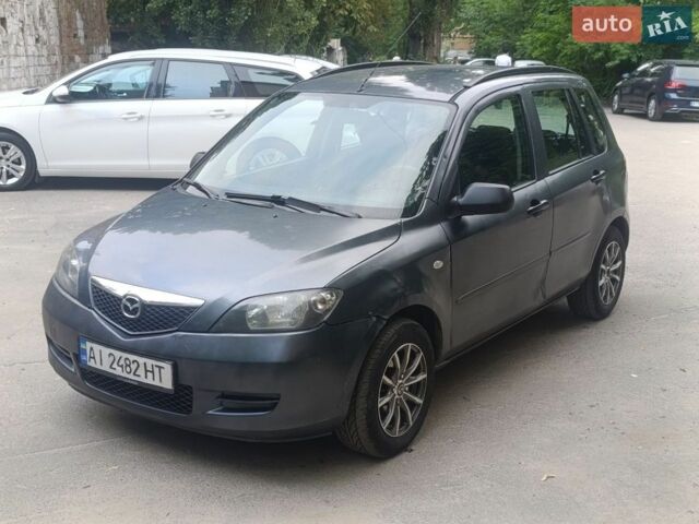 Сірий Мазда 2, об'ємом двигуна 1.4 л та пробігом 329 тис. км за 2500 $, фото 1 на Automoto.ua
