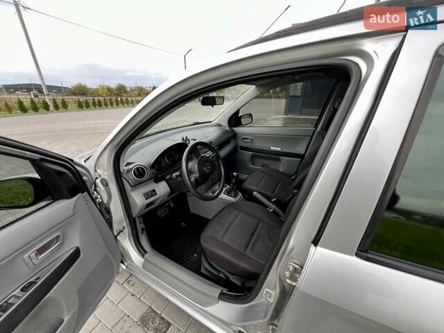 Серый Мазда 2, объемом двигателя 1.4 л и пробегом 322 тыс. км за 3700 $, фото 1 на Automoto.ua