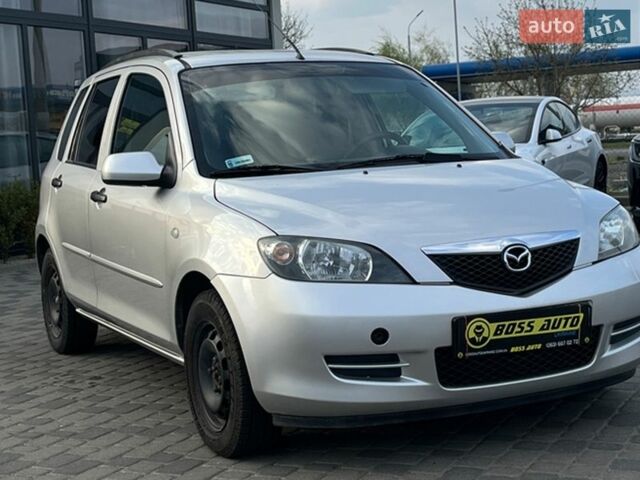 Серый Мазда 2, объемом двигателя 1.39 л и пробегом 130 тыс. км за 4300 $, фото 1 на Automoto.ua