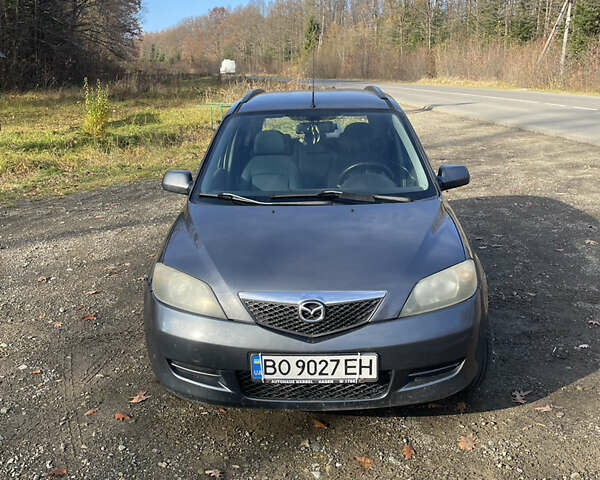 Серый Мазда 2, объемом двигателя 1.4 л и пробегом 173 тыс. км за 4800 $, фото 1 на Automoto.ua