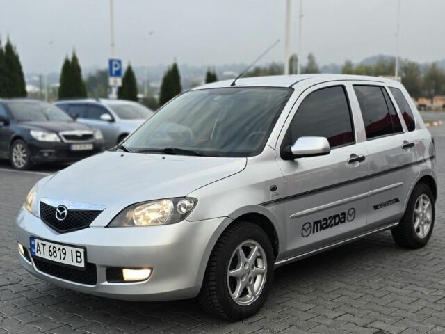 Сірий Мазда 2, об'ємом двигуна 1.4 л та пробігом 227 тис. км за 3950 $, фото 1 на Automoto.ua