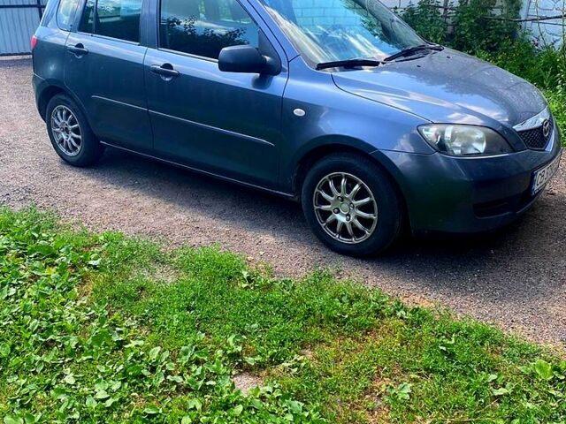 Серый Мазда 2, объемом двигателя 1.3 л и пробегом 178 тыс. км за 4050 $, фото 1 на Automoto.ua